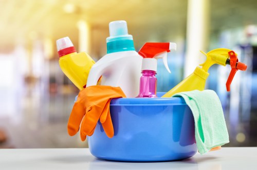 Staff using approved carpet cleaning products safely