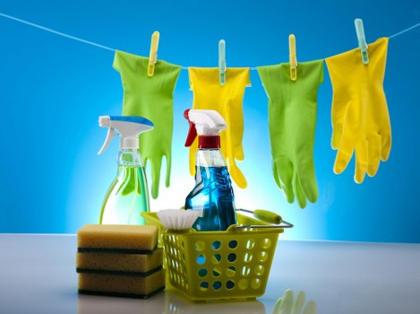 Cleaner using protective equipment during carpet cleaning